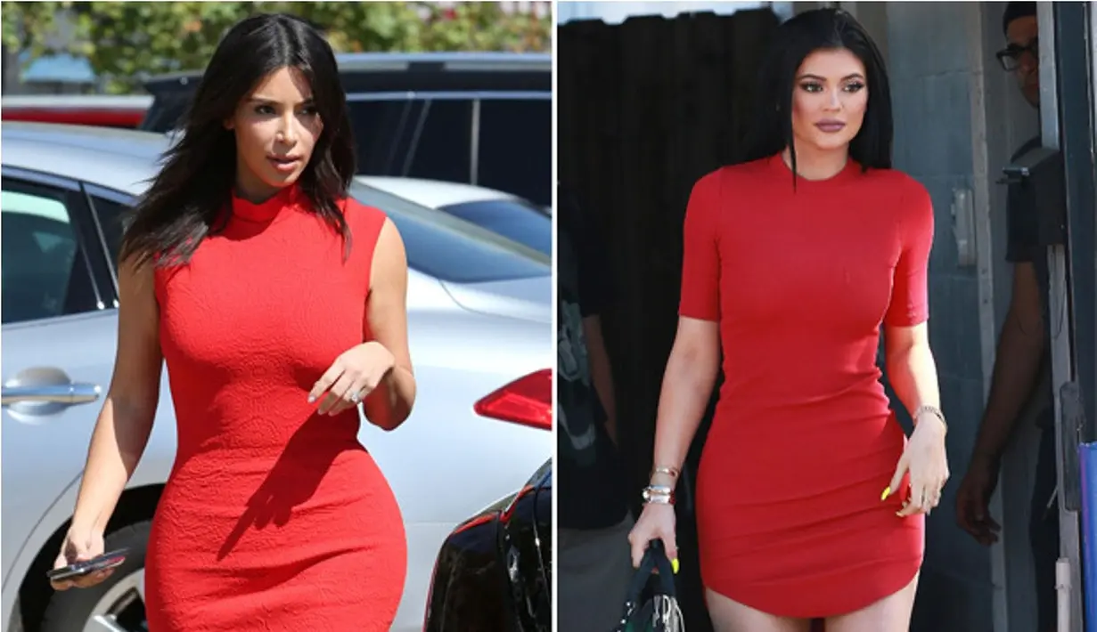 Dalam foto ini, Kylie Jenner dan Kim Kardashian memakai dress berwarna merah. Bedanya, Kim memakai dress tanpa lengan. Cantik mana? (Celebuzz)