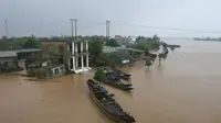 Ilustrasi banjir akibat hujan deras di Vietnam. (AFP/ Ho Cau/VNA)