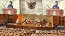 Menteri Keuangan Sri Mulyani menyampaikan laporan pemerintah saat rapat paripurna DPR ke-4 masa persidangan I tahun 2022-2023 di kompleks Parlemen, Senayan, Jakarta, Selasa (6/9/2022). Rapat paripurna tersebut beragendakan pengambilan keputusan atas RUU tentang Pertanggungjawaban atas Pelaksanaan APBN TA 2021. (Liputan6.com/Angga Yuniar)