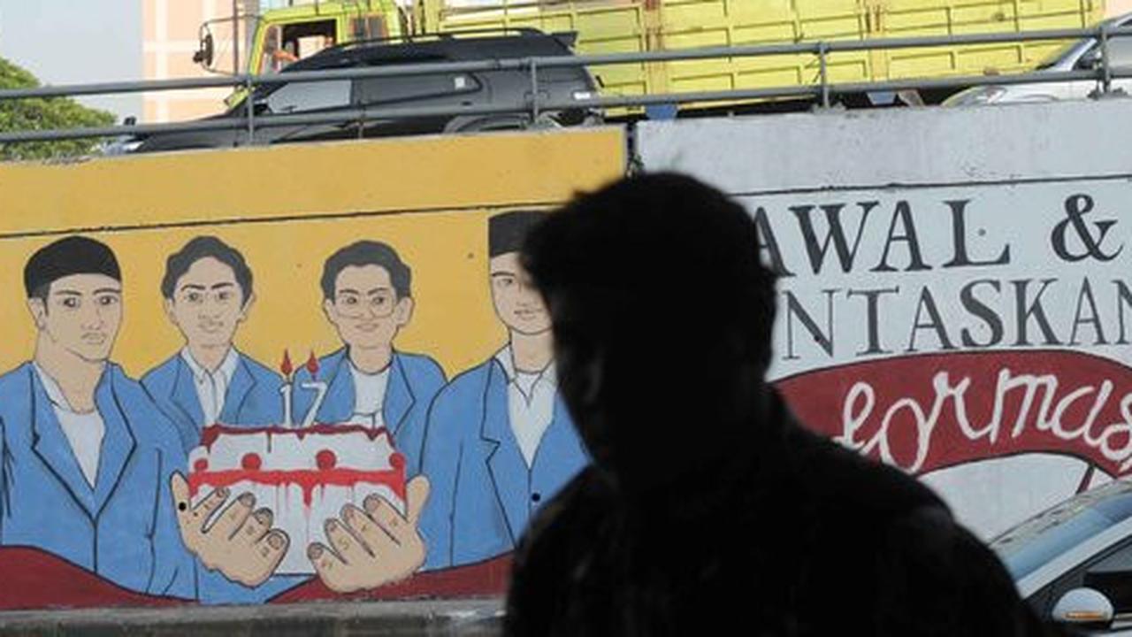 Mewarnai Jakarta dengan kritik rupa