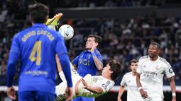 Gonzalo Garcia membuka keunggulan Madrid menjelang turun minum lewat aksi pada menit ke-44. (AP Photo/Manu Fernandez)