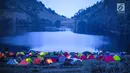 Pemandangan tenda peserta yang menginap di Ranu Kumbolo, Taman Nasional Bromo Tengger Semeru, Malang, Minggu (14/10). Sebanyak 40 pelari siap berlaga di SMI Trail Run, 11 November 2018. (Liputan6.com/HO/Eko)