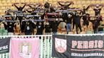 Suporter Persis Solo memberikan dukungan saat tim kesayangannya melawan Rans Cilegon FC pada laga babak 8 besar Grup X Liga 2 di Stadion Pakansari, Bogor, Rabu (15/12/2021). (Bola.com/M Iqbal Ichsan)