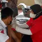 Vaksinasi massa untuk pelajar dan masyarakat Sulsel. (Istimewa)