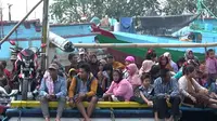 Tiap 27 Ramadan, warga Pulau Gili Probolinggo keluar pulau dan berbondong-bondong menuju ke kota untuk Petolekoran. Foto: Dian Kurniawan/ Liputan6.com.