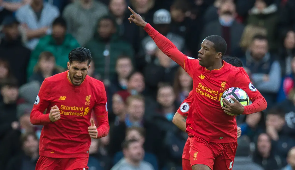 Gelandang Liverpool, Georginio Wijnaldum, merayakan gol yang dicetaknya ke gawang Burnley. Kemenangan ini membuat Liverpool mantap di peringkat empat Liga Inggris, sementara Burnley berada pada posisi ke-12. (EPA/Peter Powell)