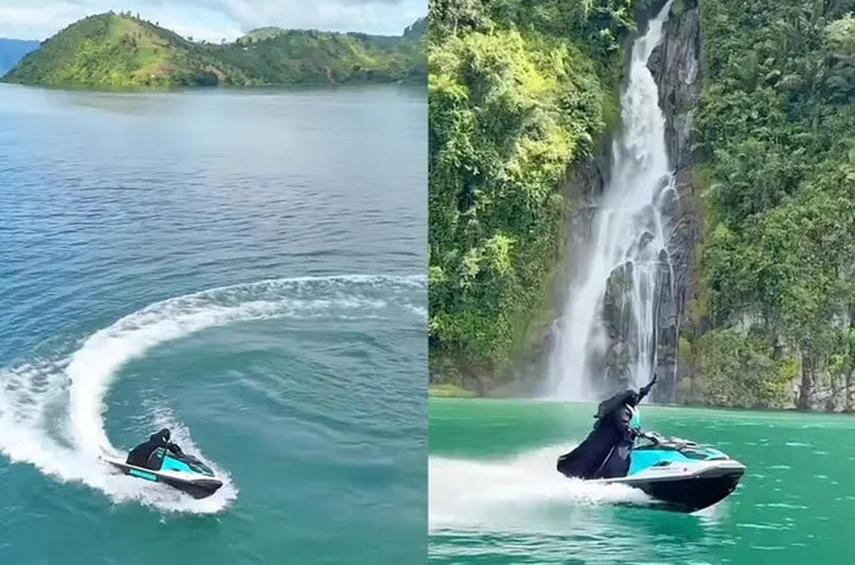 Aksi Umi Pipik Naik Speedboat di Danau Toba, Tak Risih dengan Busana dan Cadar Tertutupnya
