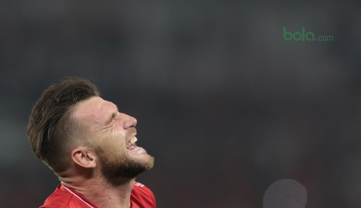 Ekspresi kegembiraan Marko Simic saat mebobol gawang Tampines Rovers pada laga Piala AFC 2018 di Stadion Utama GBK, Senayan, Jakarta (28/2/2018). Simic mencetak tiga gol untuk Persija. (Bola.com/Nick Hanoatubun)