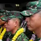 Personil TNI AD yang tergabung dalam kontingen AASAM bersiap mengikuti upacara penyambutan di Bandara Soetta, Banten, Senin (23/5/2016). TNI AD menjadi juara umum dengan meraih 23 dari 50 medali emas yang diperebutkan (Liputan6.com/Helmi Fithriansyah)