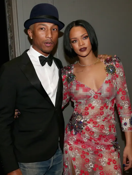 Pharrell Williams dan Rihanna saat menghadiri ajang MusiCares 2016, untuk menghormati musisi legendaris Lionel Richie, di Los Angeles, 13 Februari 2016. (Christopher Polk/Getty Images for NARAS/AFP)