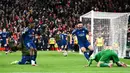 PSG keluar sebagai pemenang setelah unggul 4-2 di babak adu penalti. Kemenangan ini membuat Paris Saint-Germain lolos ke perempat final sekaligus menyingkirkan Liverpool dari Liga Champions 2024/2025. (Oli SCARFF/AFP)