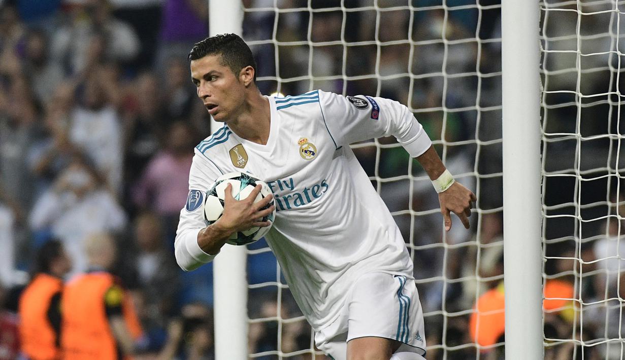 Cristiano Ronaldo. Striker Portugal berusia 37 tahun yang kini kembali memperkuat Manchester United ini pernah berseragam Real Madrid selama 9 musim mulai 2009/2010 hingga 2017/2018. Ia menjadi top skor Los Blancos di Liga Champions dengan 105 gol dari total 101 laga. (AFP/Pierre-Philippe Marcou)