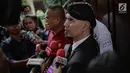 Musikus Ahmad Dhani memberi keterangan kepada awak media usai menjalani sidang kedua kasus ujaran kebencian  di PN Jakarta Selatan, Senin (23/4). (Liputan6.com/Faizal Fanani)