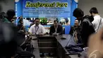 Ko Shun-chi (kanan) dari kepolisian Hongkong  dan Humas BNN Kombes Pol Sumirat Dwiyanto, Jakarta, Kamis (15/1/2015). (Liputan6.com/Faizal Fanani)