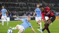 AC Milan meraih kemenangan 2-1 atas Lazio pada laga pekan ke-34 Serie A di Stadio Olimpico, Senin (25/4/2022) dini hari WIB. (AP Photo/Andrew Medichini)