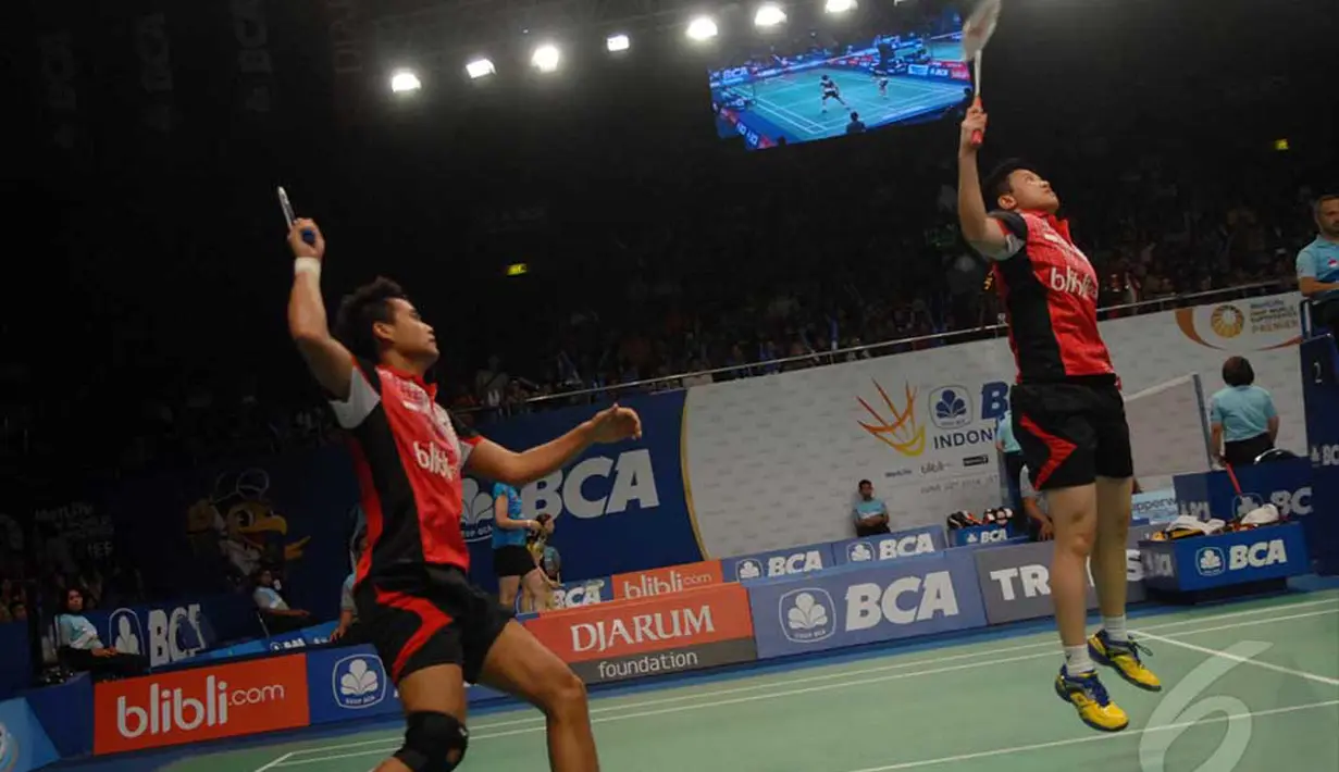  Sempat kalah di gim ke-2, Tontowi Ahmad/Liliyana Natsir bangkit dan menghempaskan perlawanan Shin Baek Chol/Jang Ye Na dengan skor 21-13, Jakarta, Kamis (19/6/2014) (Liputan6.com/Miftahul Hayat).
