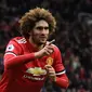 AC Milan dikabarkan sudah membuka pembicaraan dengan pihak Marouane Fellaini perihal kemungkinan transfer pada musim panas 2018. (AFP/Paul Ellis)