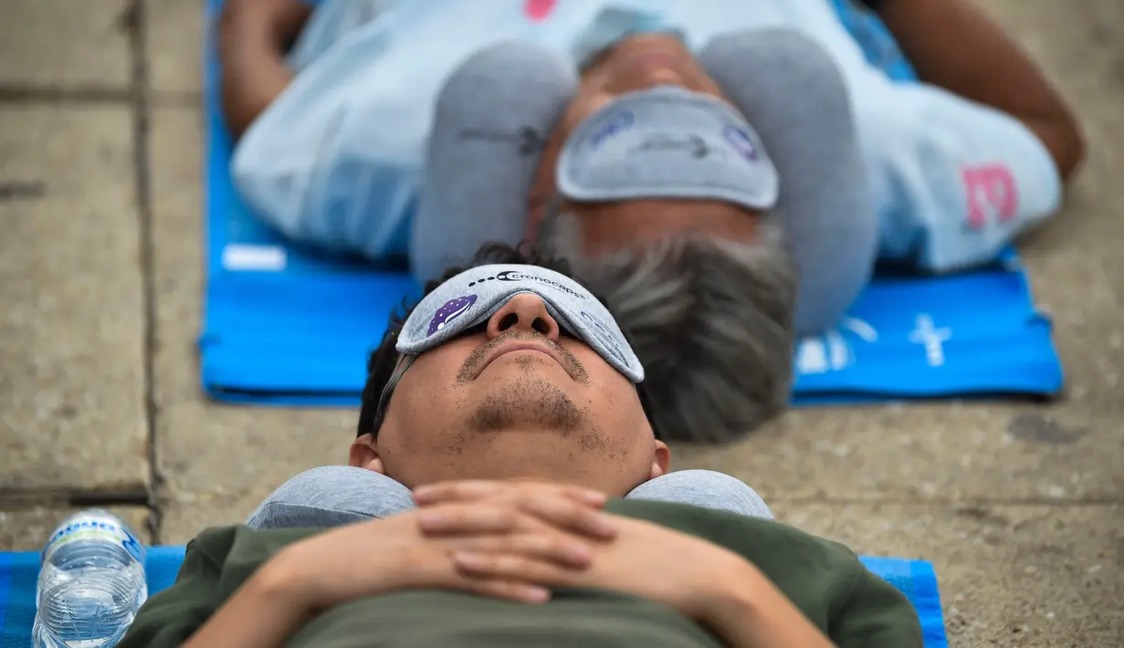 Tidur yang baik dan cukup akan membantu mempertahankan dan mengoptimalkan fungsi otak serta meningkatkan daya tahan tubuh terhadap penyakit. (Rodrigo Oropeza/AFP)