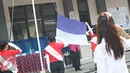 Warga binaan rumah tahanan klas II A Pondok Bambu mengikuti lomba pengibaran bendera di Jakarta, Kamis (21/4). Lomba diadakan memperingati Hari Kartini agar semangatnya tetap menggelora di hati para warga binaan wanita. (Liputan6.com/Immanuel Antonius)