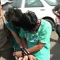 3 Pemuda pembunuh wartawati di Depok ditangkap kepolisian. (Liputan6.com/Atem Allaatif)