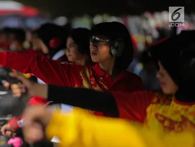 Puluhan polwan mengikuti kejuaran menembak Polwan Cup tahun 2017 di Lapangan tembak Brimob, Kelapa Dua, Depok, Senin (4/9). Kejuaran ini digelar dalam rangka hut Polwan ke-69. (Liputan6.com/Faizal Fanani)