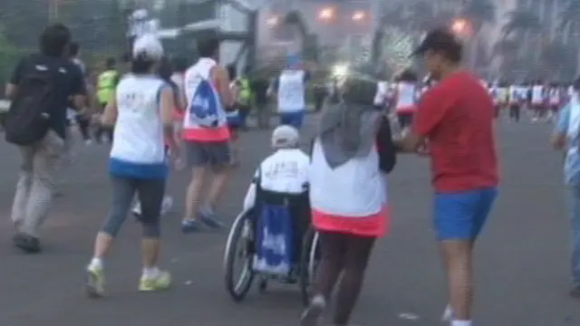 Berkursi Roda, Raechanah Antusias Ikut Jakarta Marathon
