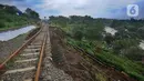 <p>Tim Sar mencari korban hilang akibat <a href="https://www.liputan6.com/photo/read/5228238/longsor-natuna-pencarian-korban-di-desa-pangkalan-terus-dilakukan?page=1" rel="nofollow">longsor </a>tebing di jalur perlintasan Kereta Api (KA) Bogor-Sukabumi di Kampung Sirnasari, Kelurahan Empang, Kota Bogor, Rabu (15/3/2023). (merdeka.com/Arie Basuki)</p>