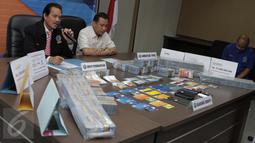 Deputi Pemberantasan Narkotika, Irjen Pol Arman Depari memberikan keterangan saat merilis Tindak Pidana Pencucian Uang (TPPU) narkotika di BNN, Jakarta, Kamis (24/11). BNN menyita aset senilai Rp 153 Miliar dari tersangka MI. (Liputan6.com/Gempur M Surya)