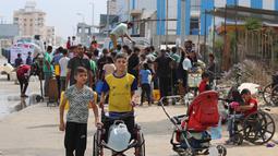 Peningkatan jumlah anak-anak yang mengalami kekurangan gizi seiring berlanjutnya pembatasan bantuan, pengungsian, dan serangan oleh Israel  di Jalur Gaza. (Eyad BABA/AFP)