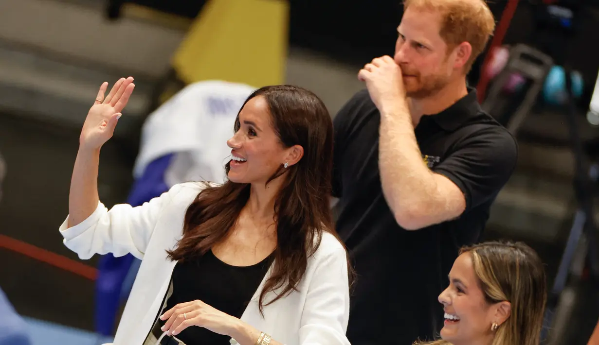 Ini adalah keempat kalinya Meghan dan Harry tampil bersama di Invictus Games. (Odd ANDERSEN / AFP)