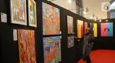 Pengunjung melihat-lihat sejumlah karya lukis yang dipamerkan di Museum Kebangkitan Nasional, Jakarta, Selasa (20/5/2025). (Liputan6.com/Herman Zakharia)