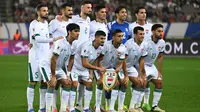Para pemain Timnas Irak berpose untuk foto tim sebelum pertandingan kualifikasi Piala Dunia FIFA 2026 zona Asia antara Korea Selatan dan Irak di Yongin pada 15 Oktober 2024. (JUNG YEON-JE/AFP)