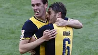 Koke - Diego Godin (QUIQUE GARCIA / AFP)