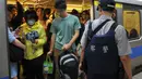 Dengan sebilah pisau, pemuda itu melakukan serangan membabi buta yang menewaskan empat orang dan melukai 21 orang lainnya di Taipei, Taiwan, Rabu (21/5/14). (AFP PHOTO/Mandy Cheng)
