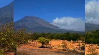 Status Gunung Agung yang terletak di Kabupaten Karangasem, Bali, naik dari Waspada (Level II) ke Siaga (Level III). (Liputan6.com/Dewi Divianta)