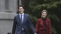 PM Kanada Justin Trudeau dan Sophie Gregoire Trudeau pada 2019. (Justin Tang/The Canadian Press via AP, File)