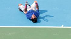 Ekspresi petenis Filipina, Alberto Lim usai mengalahkan petenis Indonesia David Agung Susanto pada Piala Davis 2018 grup dua Asia/Oceania di Senayan, Jakarta, Sabtu (4/2/2018). Alberto menang 6-3, 6-4. (Bola.com/Nick Hanoatubun)