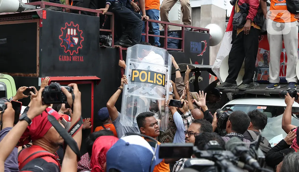 Langkah DPR RI terkait revisi RUU Pilkada menimbulkan penolakan dari masyarakat. (Liputan6.com/Angga Yuniar)