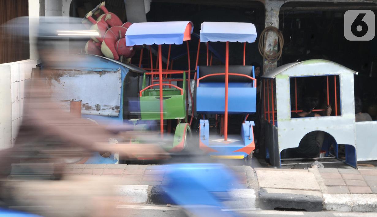 FOTO Nestapa Pembuat Odong Odong Di Tengah Larangan Dishub DKI News Liputan6com