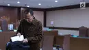 Mantan Menteri Agama Suryadharma Ali usai menjalani sidang lanjutan Peninjauan Kembali (PK) di PN Jakarta Pusat, Rabu (25/7/2018). Pada persidangan ini kuasa hukum pemohon membacakan kesimpulan pengajuan PK. (Liputan6.com/Helmi Fithriansyah)