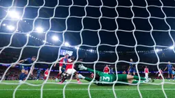 Arsenal berhasil memastikan tempat di final Liga Champions 2025/2026 setelah mengalahkan Atletico Madrid dengan skor tipis 1-0 pada leg kedua semifinal yang digelar di Emirates Stadium, London, Rabu (6/5/2026) dini hari WIB. (AFP/Adrian Dennis)