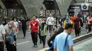 Warga berolahraga saat car free day di kawasan Bundaran HI, Jakarta, Minggu (4/12/2022). Kementerian Kesehatan mengungkapkan bahwa kasus COVID-19 di Indonesia mengalami penurunan sebanyak 632 kasus. (Liputan6.com/Faizal Fanani)