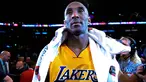 Pemain Los Angeles Lakers, Kobe Bryant bersedih usai pertandingan antara Lakers melawan Utah Jazz di Staples Center, AS, (13/4). Di akhir karirnya, Kobe menelan pil pahit harus kalah dari Utah Jazz dengan skor 101-96. (Robert Hanashiro-USA TODAY Sports)
