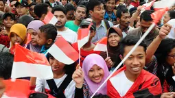 Acara perayaan ini digelar oleh gabungan tim relawan Jokowi-Jusuf Kalla di Tugu Proklamasi, Jakarta Pusat, Rabu (23/7/14). (Liputan6.com/Andrian M Tunay)