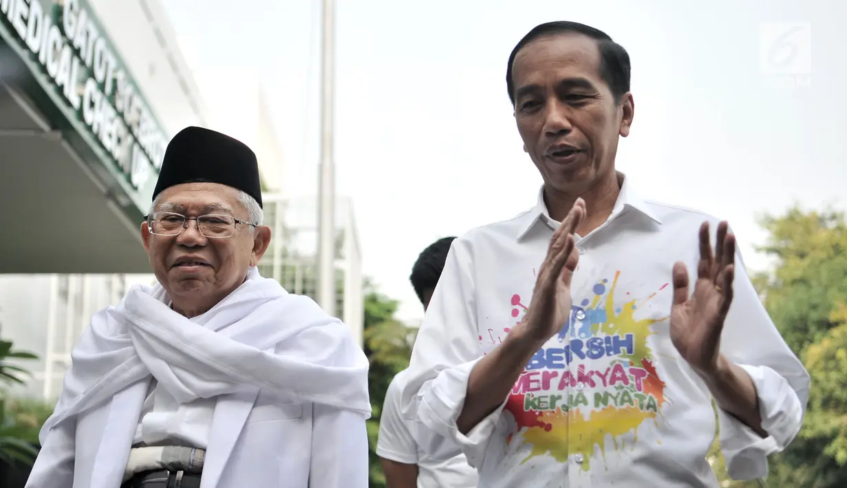Pasangan bakal calon presiden dan wakil presiden Joko Widodo atau Jokowi (kanan) dan KH Ma'ruf Amin (kiri) saat tiba di RSPAD Gatot Subroto, Jakarta, Minggu (12/8). Keduanya menjalani tes kesehatan jelang Pilpres 2019. (Merdeka.com/Iqbal Nugroho)