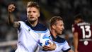 Ciro Immobile berhasil membubuhkan namanya di pemuncak top skor Liga Italia 2021/2022 hingga pekan ini. Ia tercatat telah mengoleksi enam gol dan dua assist dari enam penampilannya, selisih satu angka dengan Edin Dzeko di Inter Milan. (AFP/Marco Bertorello)