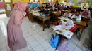 Al Dewi dan Al Putri mudah beradaptasi dan diterima dengan baik oleh teman dan guru-gurunya di sekolah. (merdeka.com/Arie Basuki)