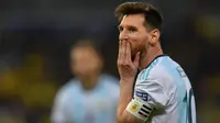 Ekspresi Lionel Messi setelah Argentina kalah dari Brasil 0-2 pada semifinal Copa America 2019 di Lionel Messi, Argentina, Copa America di Stadion Mineirao, Belo Horizonte, Rabu (3/7/2019) pagi WIB. (AFP/Pedro Ugarte)