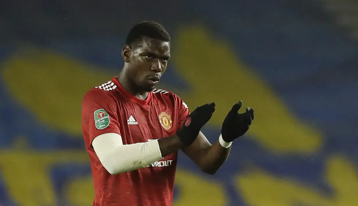 Gelandang Manchester United,  Paul Pogba, merayakan gol yang dicetaknya ke gawang Brighton pada laga Carabao Cup di Stadion Falmer, Kamis (1/10/2020) dini hari WIB. Manchester United menang 3-0 atas Brighton. (Matt Dunham/Pool via AP)