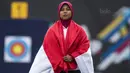 Pepanah putri Indonesia, Sri Ranti, bersiap menerima medali SEA Games cabang panahan nomor compound di National Sports Council, Kuala Lumpur, Rabu (16/8/2017). Dirinya meraih emas pertama untuk Indonesia. (Bola.com/Vitalis Yogi Trisna)